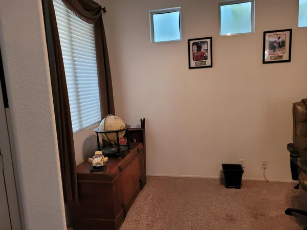 a room with furniture and a window