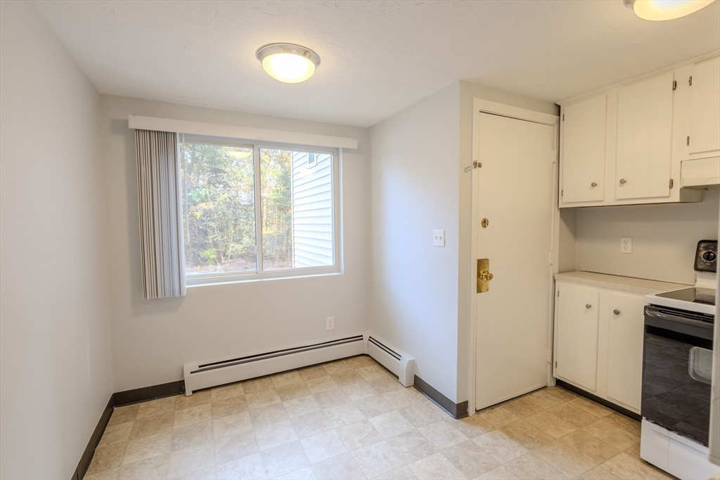 5 Tideview Path, Unit 4 Plymouth, MA 02360 - Photo 14 of 16 a view of a room with window and cabinet