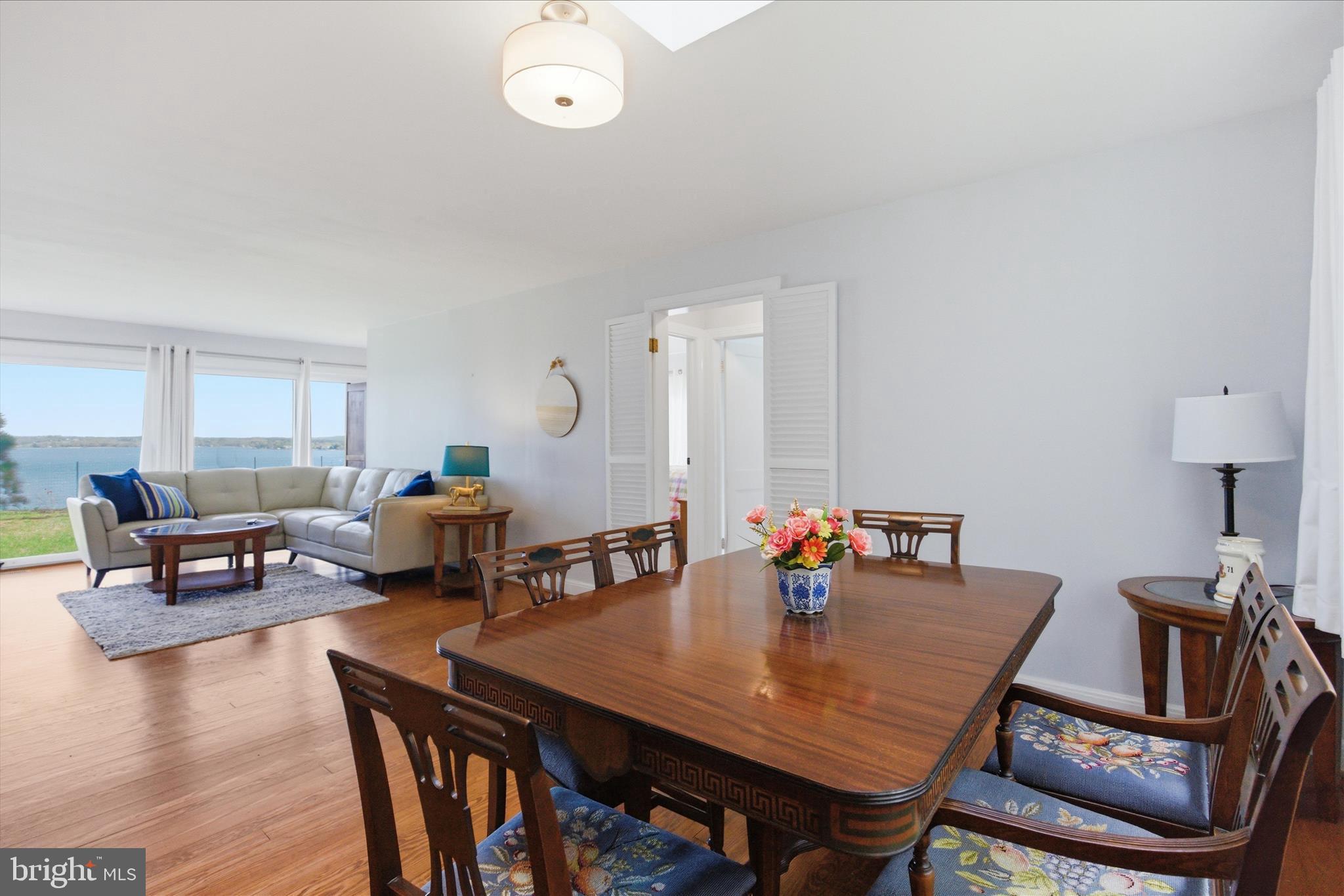43732 Raspberry Lane Hollywood, MD 20636 - Photo 22 of 54 a view of a dining room with furniture and wooden floor