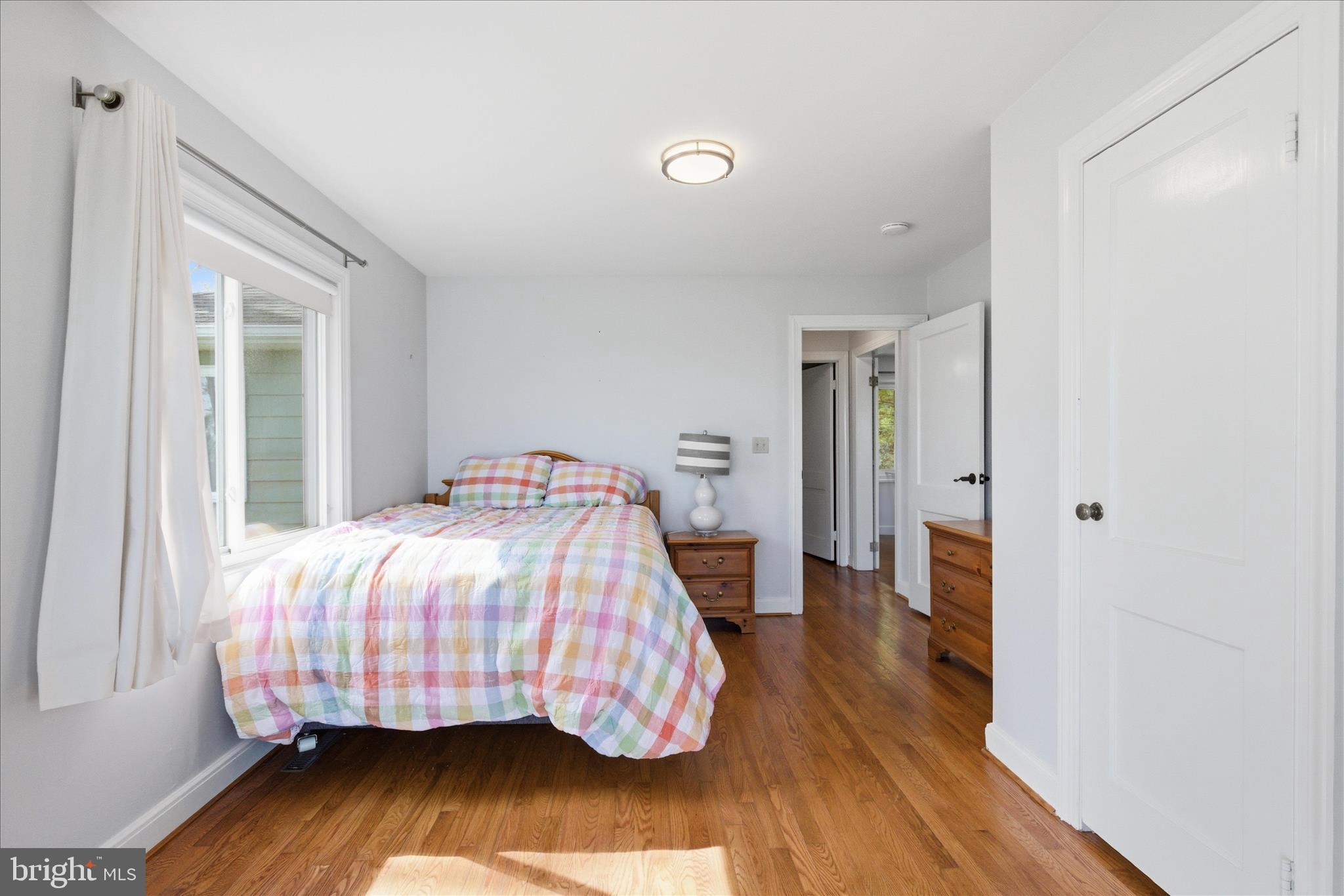 43732 Raspberry Lane Hollywood, MD 20636 - Photo 28 of 54 a bedroom with a bed and wooden floor