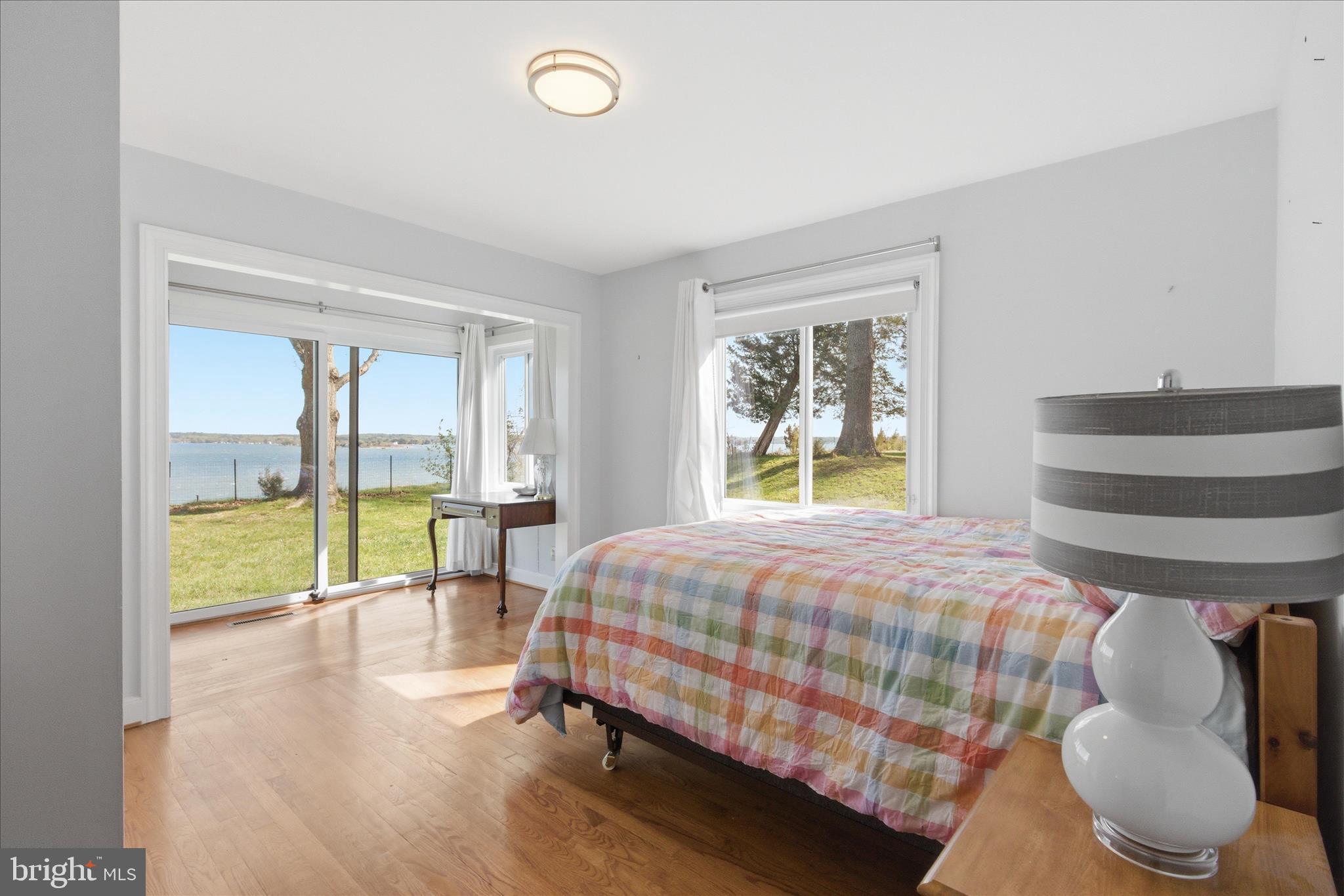 43732 Raspberry Lane Hollywood, MD 20636 - Photo 29 of 54 a bedroom with a bed and large windows