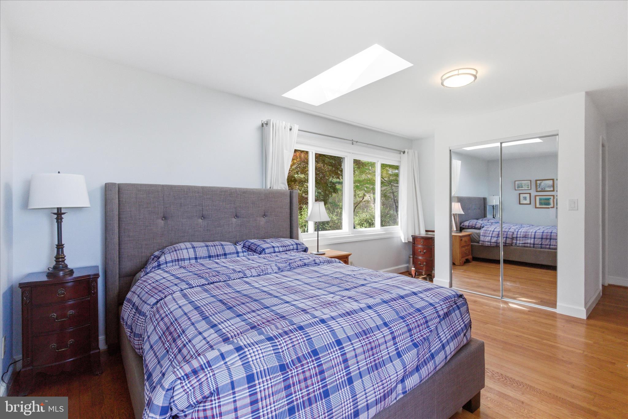 43732 Raspberry Lane Hollywood, MD 20636 - Photo 31 of 54 a bedroom with a bed and a large window