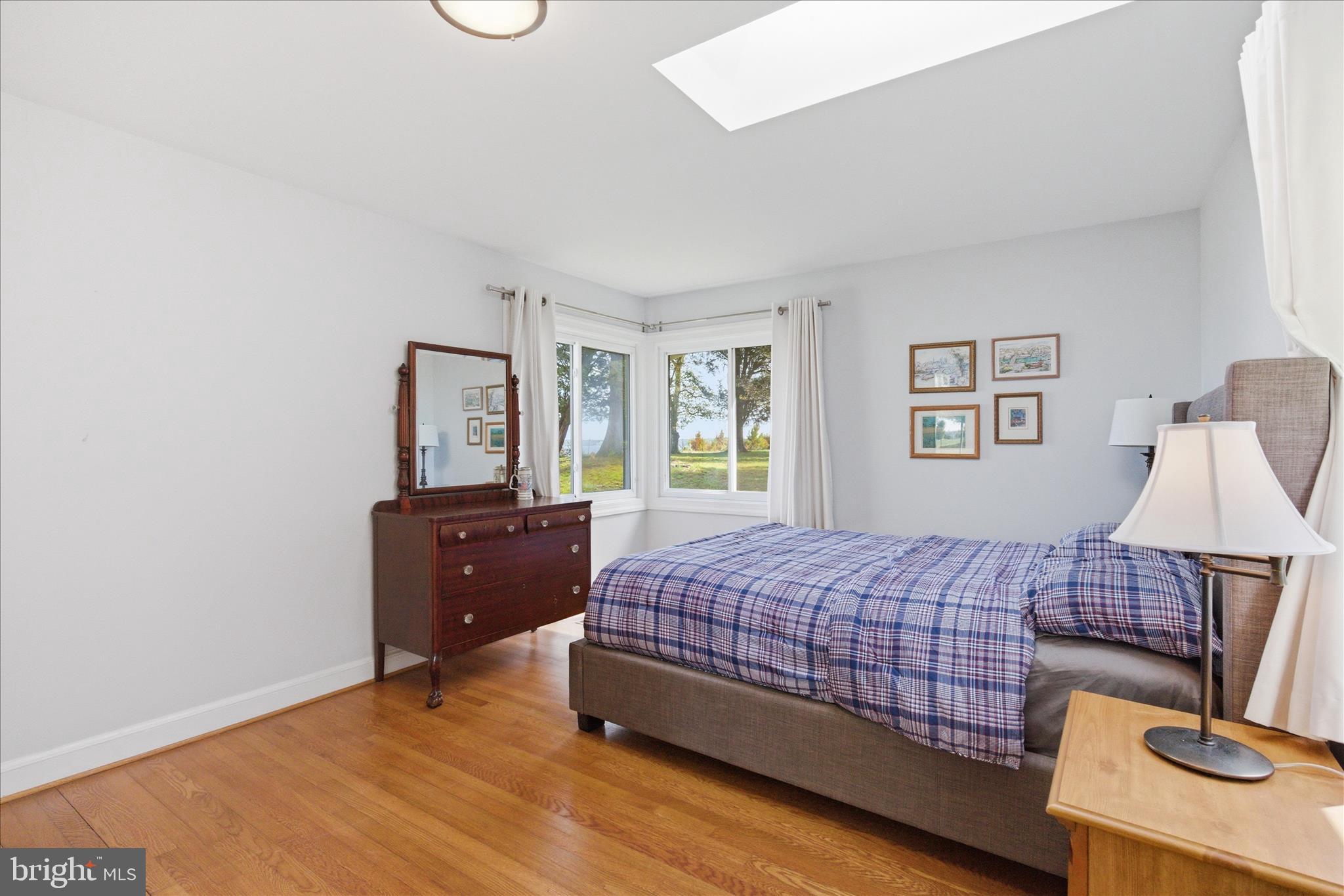 43732 Raspberry Lane Hollywood, MD 20636 - Photo 34 of 54 a bedroom with a bed and wooden floor