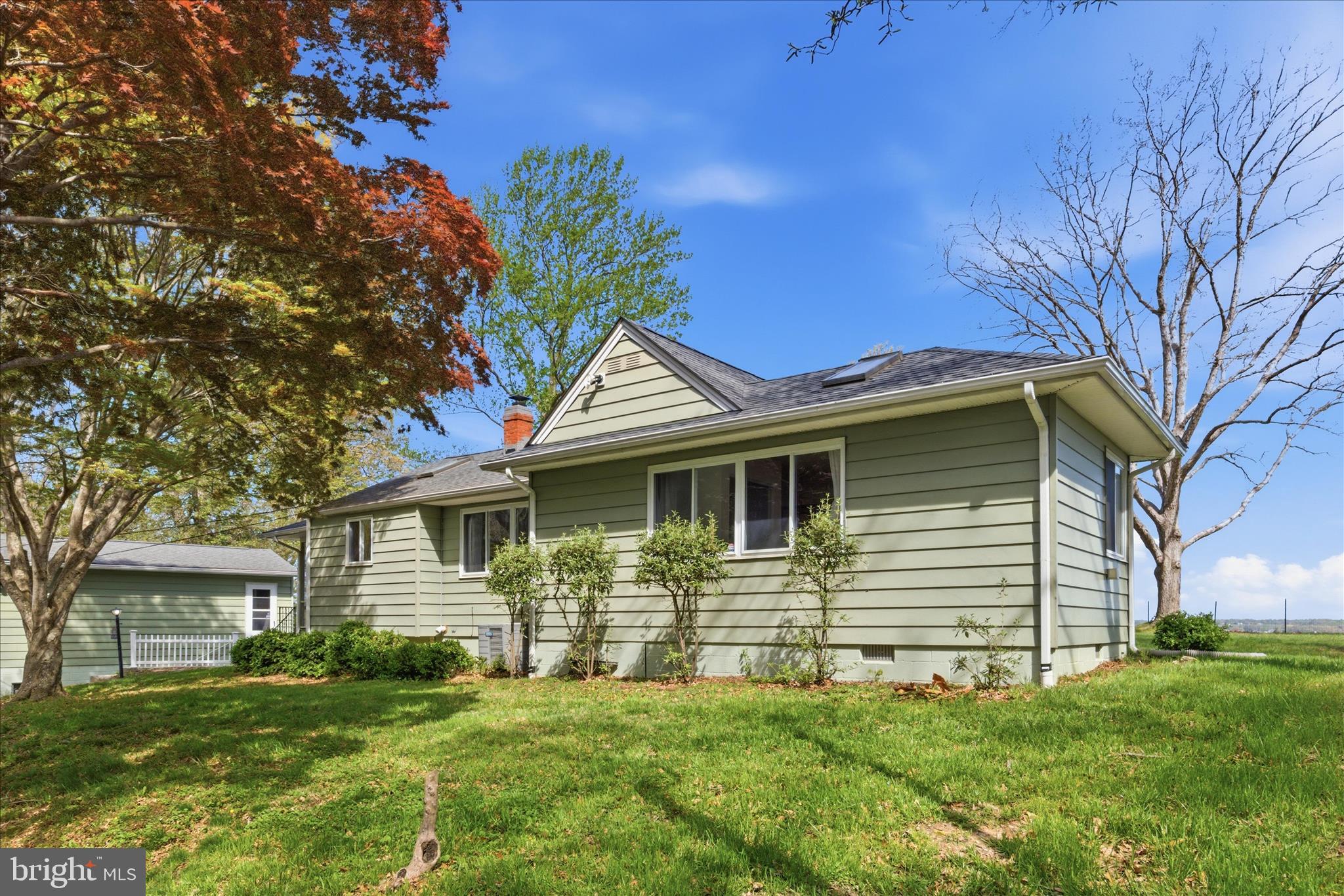 43732 Raspberry Lane Hollywood, MD 20636 - Photo 4 of 54 a front view of a house with a garden
