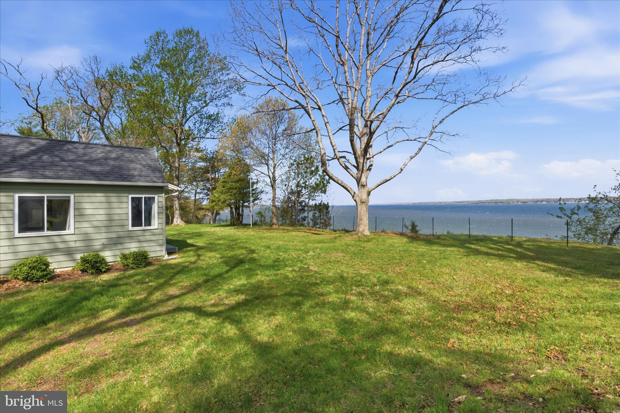 43732 Raspberry Lane Hollywood, MD 20636 - Photo 43 of 54 a backyard of a house with lots of green space