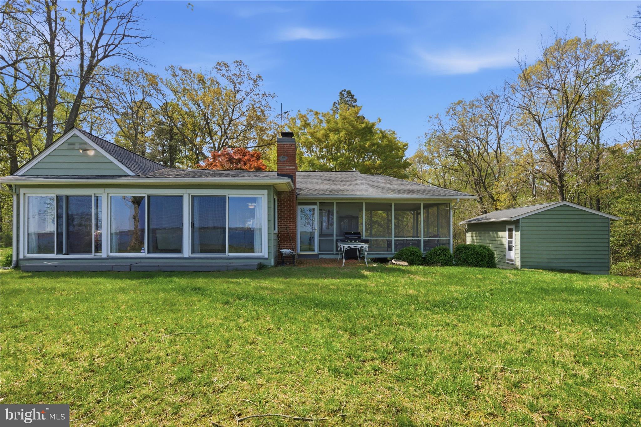43732 Raspberry Lane Hollywood, MD 20636 - Photo 46 of 54 a front view of a house with a garden and trees