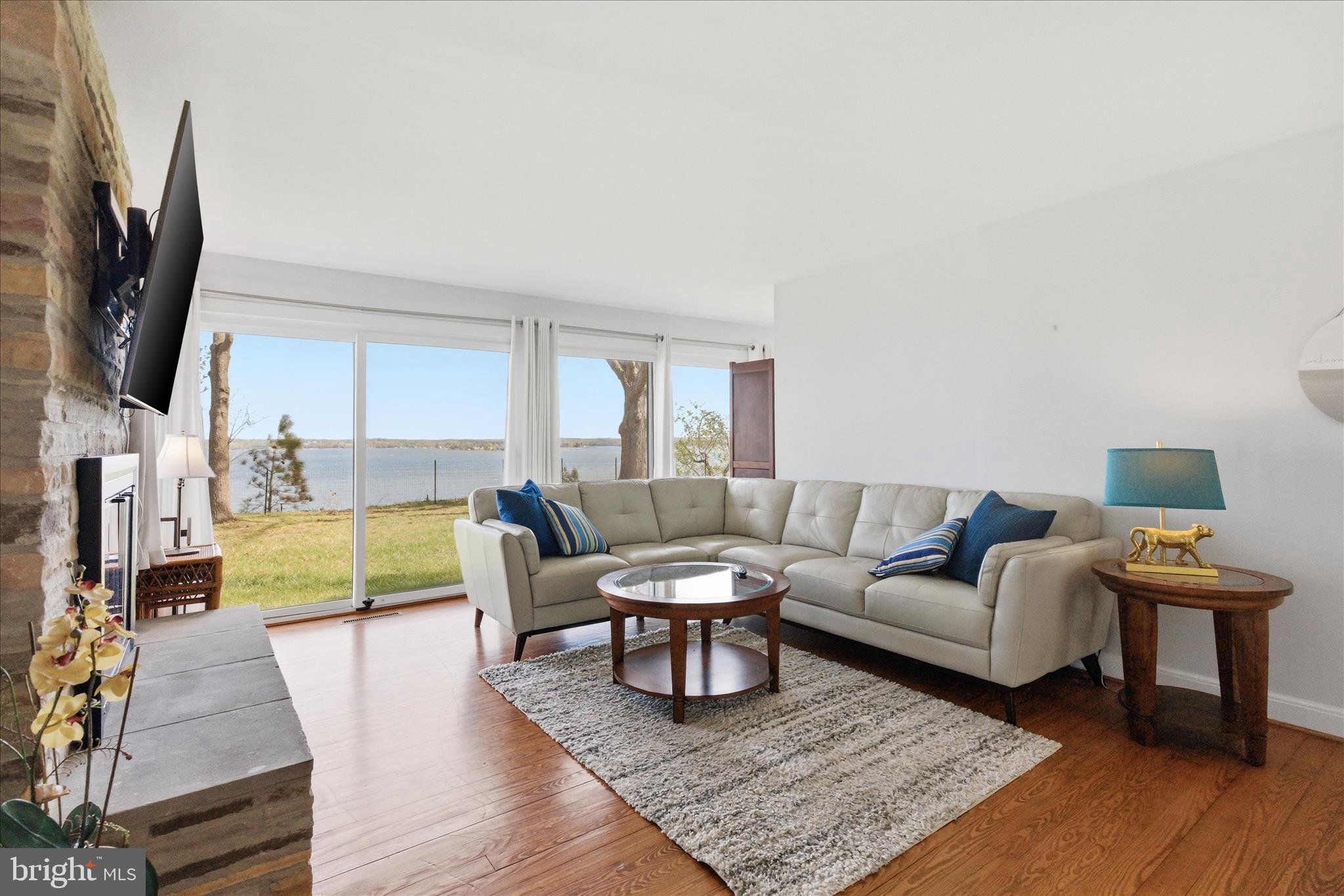 43732 Raspberry Lane Hollywood, MD 20636 - Photo 8 of 54 a living room with furniture and a flat screen tv