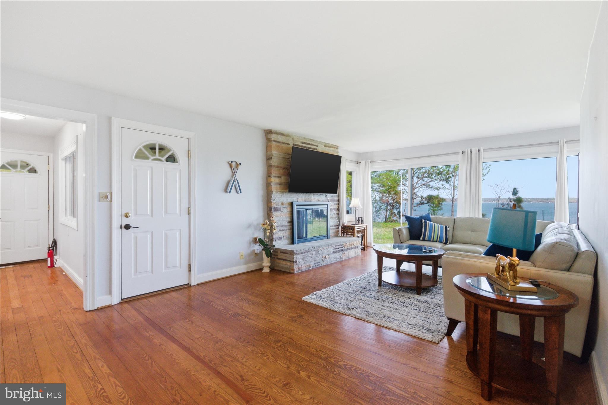 43732 Raspberry Lane Hollywood, MD 20636 - Photo 10 of 54 a living room with furniture wooden floor and a flat screen tv