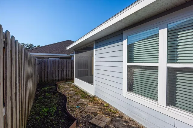 a view of room with a ceiling fan