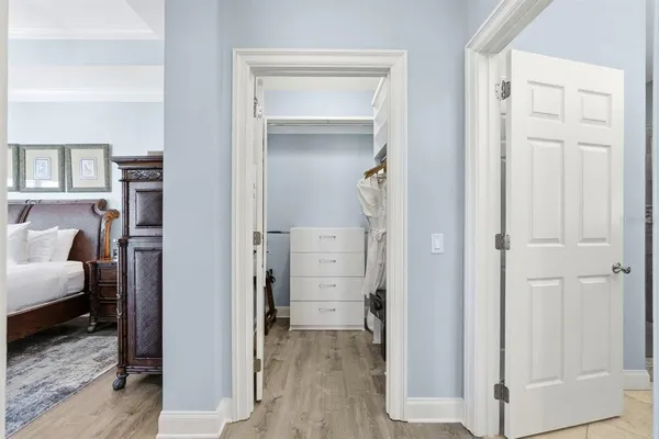a bedroom with bed and a window