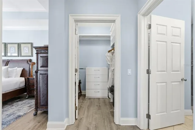 a bedroom with bed and a window