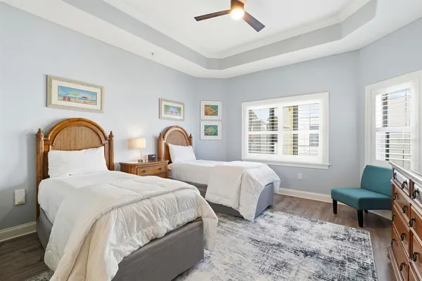 a bedroom with a bed and a couch
