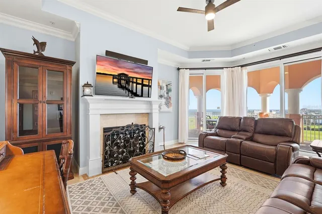 a kitchen with stainless steel appliances granite countertop a stove refrigerator and cabinets
