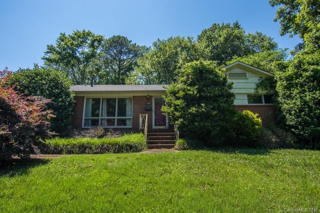 7424 Watercrest Road, Unit 14 Charlotte, NC 28210 - Photo 1 of 21 a front view of a house with a yard