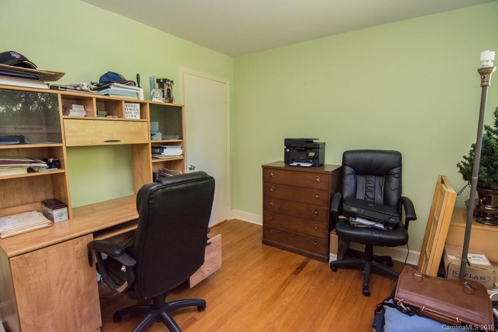 7424 Watercrest Road, Unit 14 Charlotte, NC 28210 - Photo 12 of 21 a view of a workspace with furniture and wooden floor