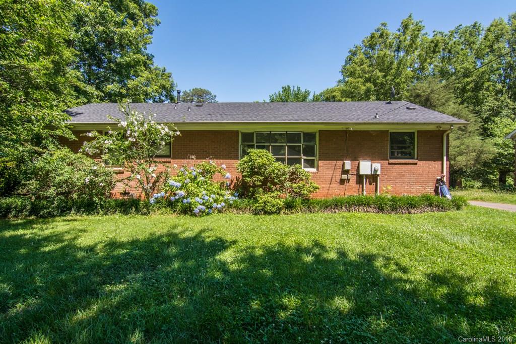 7424 Watercrest Road, Unit 14 Charlotte, NC 28210 - Photo 21 of 21 a front view of a house with a yard