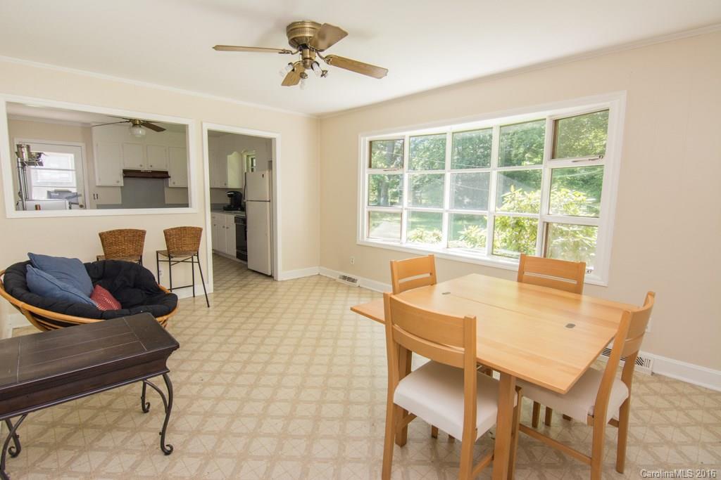 7424 Watercrest Road, Unit 14 Charlotte, NC 28210 - Photo 5 of 21 a view of a dining room with furniture window and outside view