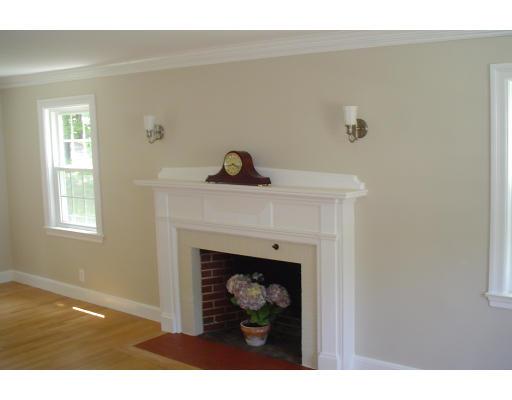 40 Clifton Road Milton, MA 02186 - Photo 4 of 9 a view of a livingroom with a fireplace