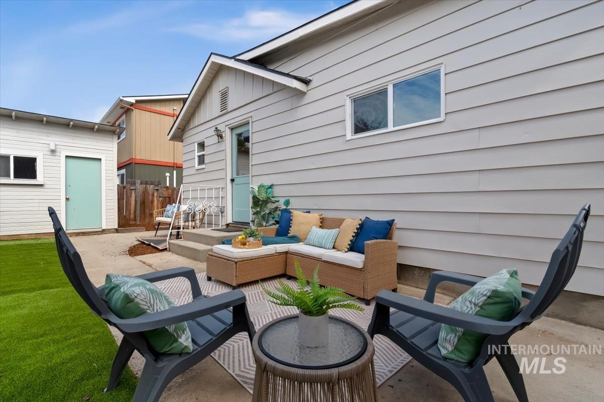 3005 West Hester Street Boise, ID 83702 - Photo 28 of 32 Rear patio featuring concrete surfacing and artificial turf