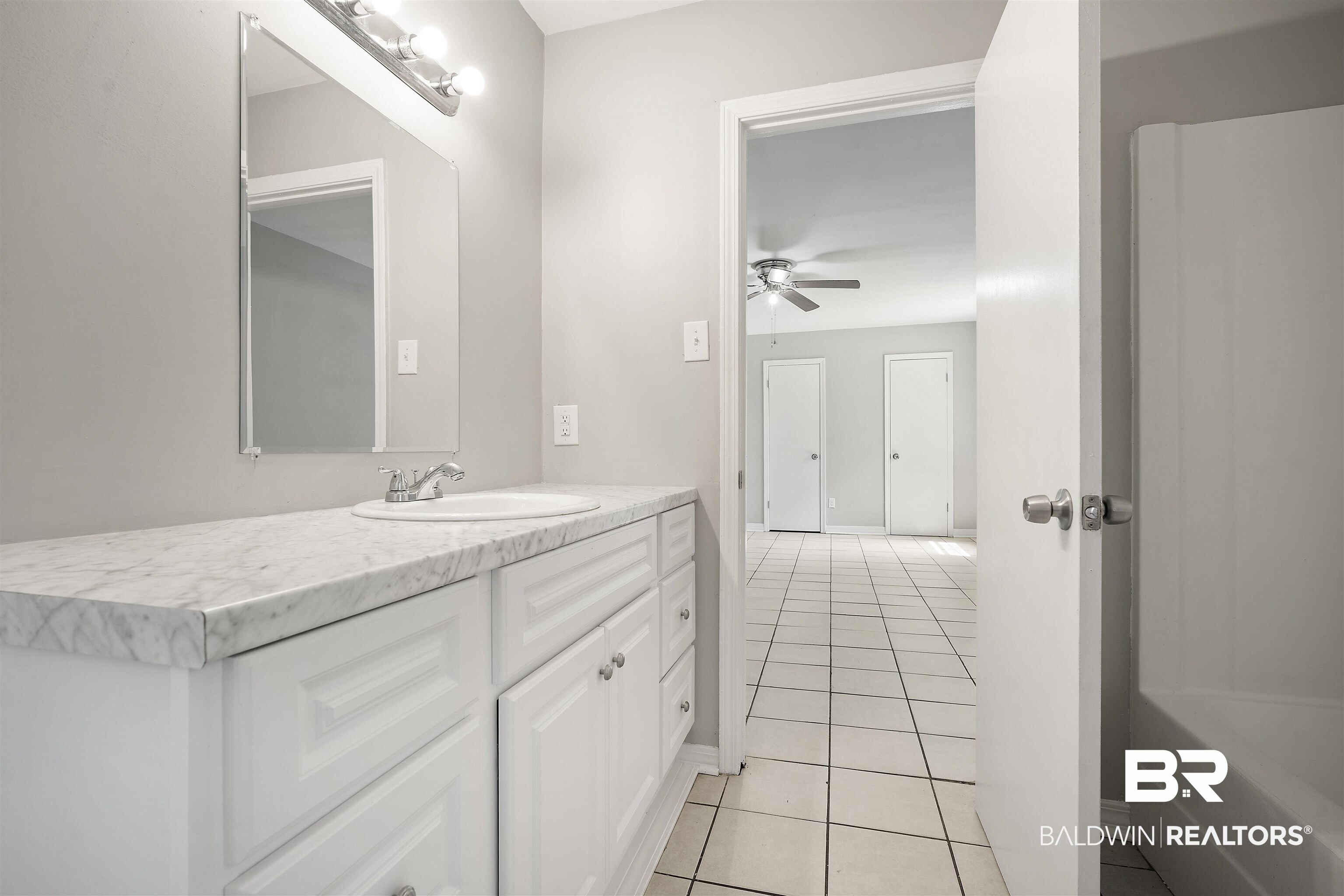 963 Shady Brook Drive Mobile, AL 36606 - Photo 15 of 20 Bathroom featuring vanity, tile patterned floors, ceiling fan, and baseboards