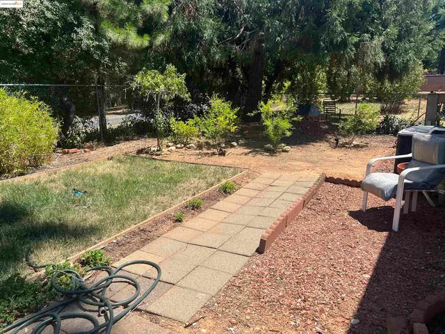 a view of swimming pool with a patio