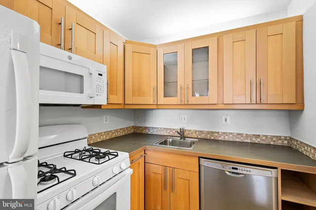 a bed room with a bed and a window