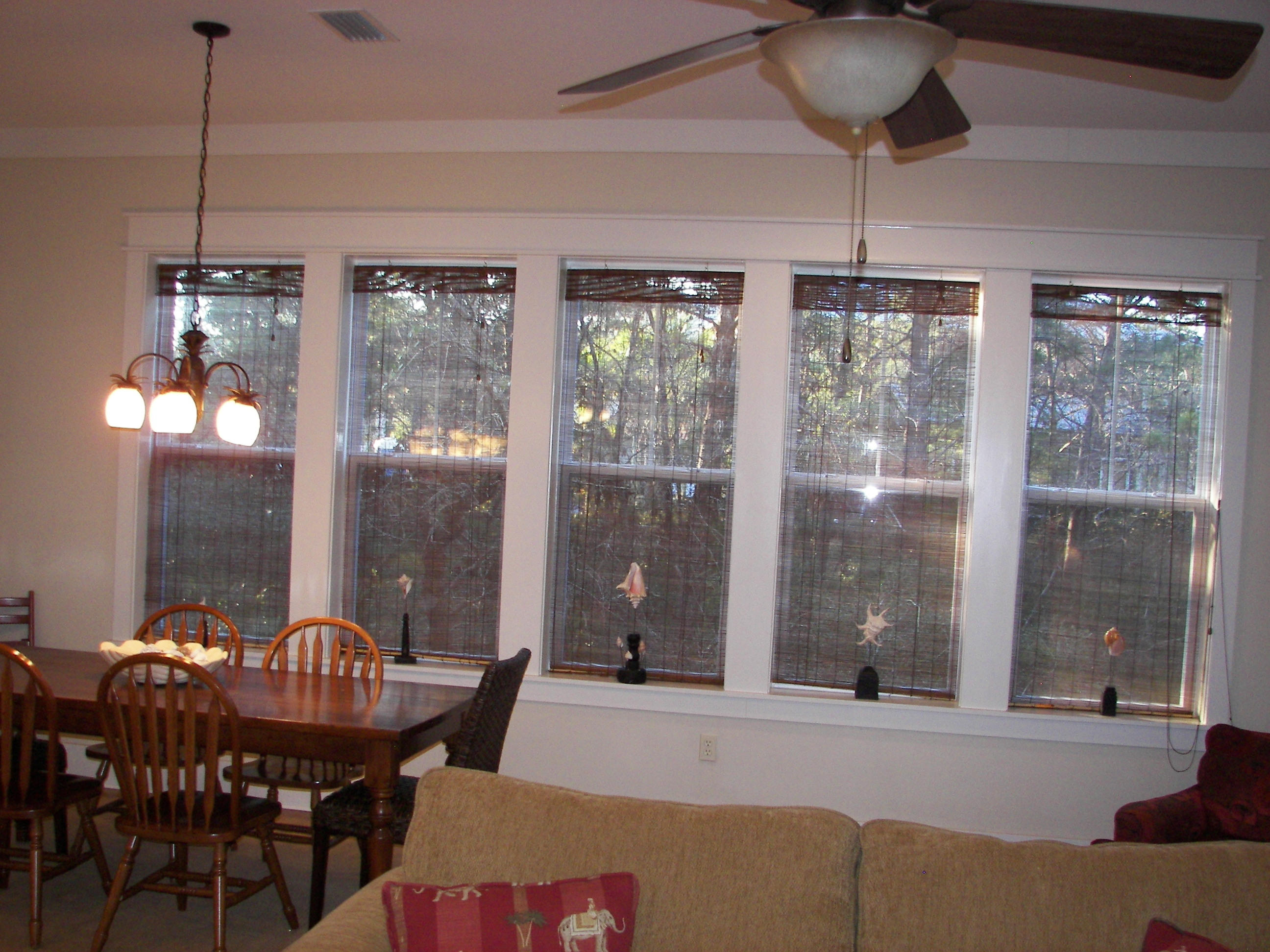 69 Lifeguard Loop West Inlet Beach, FL 32461 - Photo 13 of 34 a dining room with furniture a chandelier and window