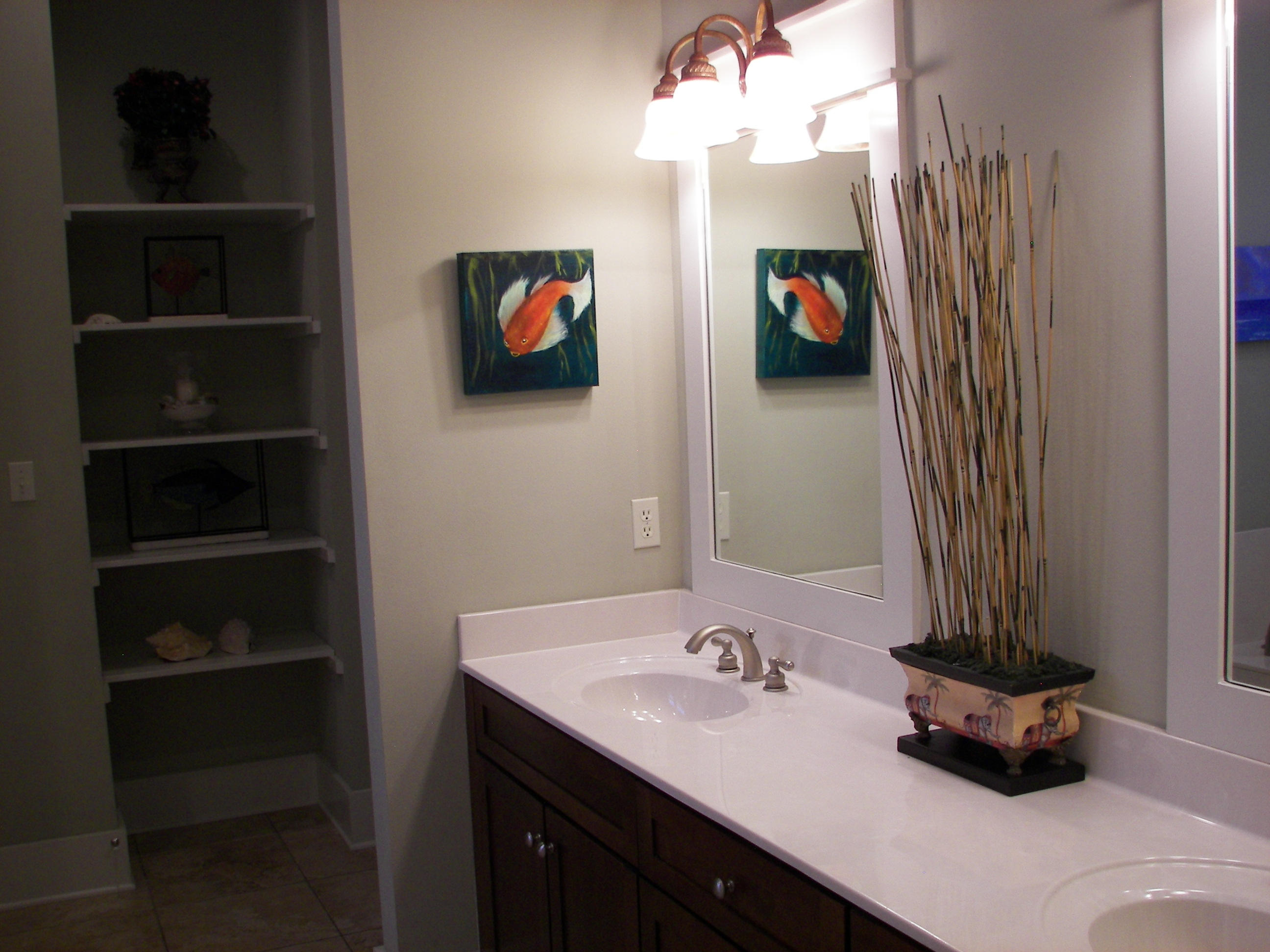 69 Lifeguard Loop West Inlet Beach, FL 32461 - Photo 24 of 34 a bathroom with a sink and a mirror