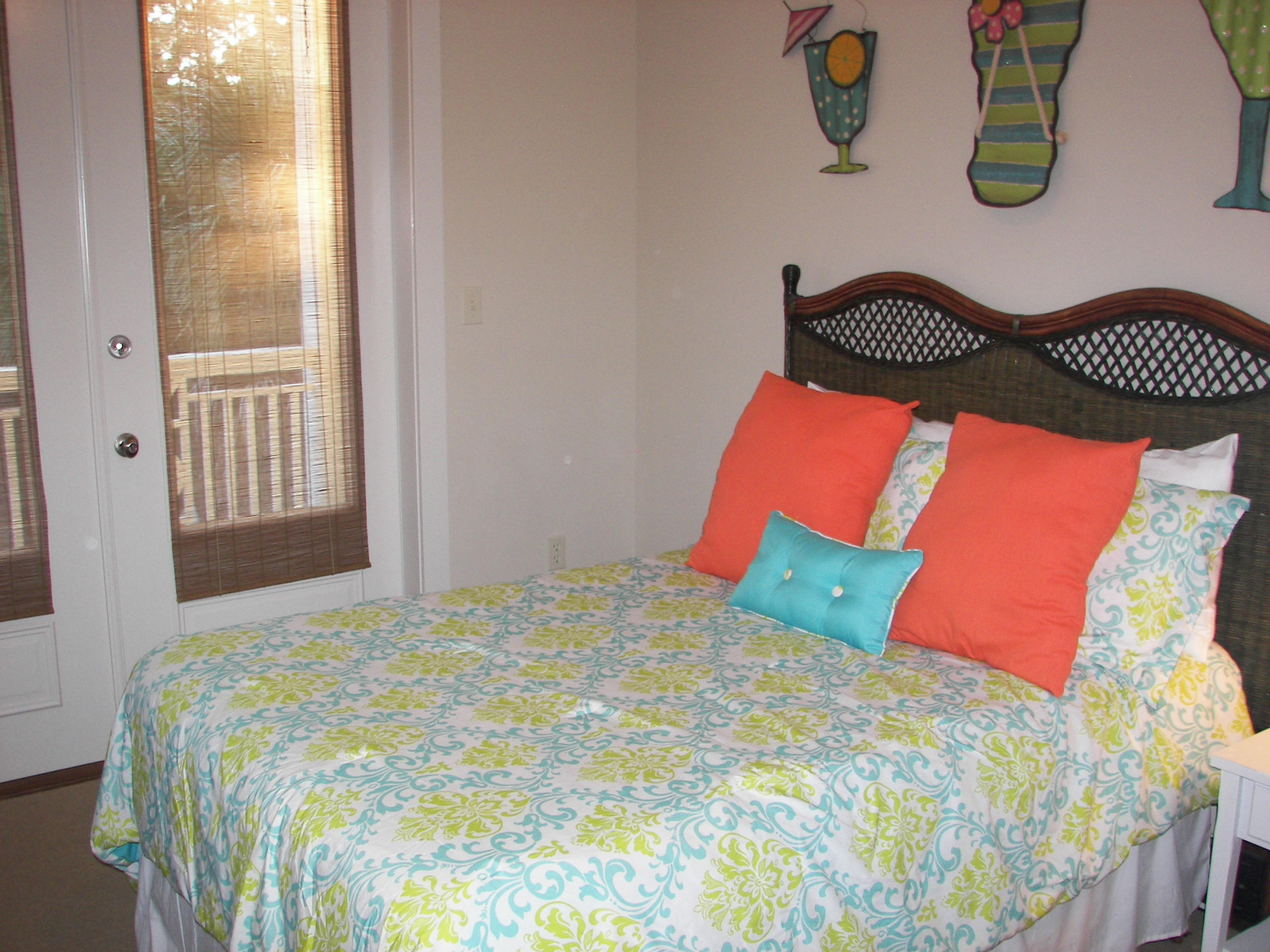 69 Lifeguard Loop West Inlet Beach, FL 32461 - Photo 32 of 34 a bedroom with a bed and window
