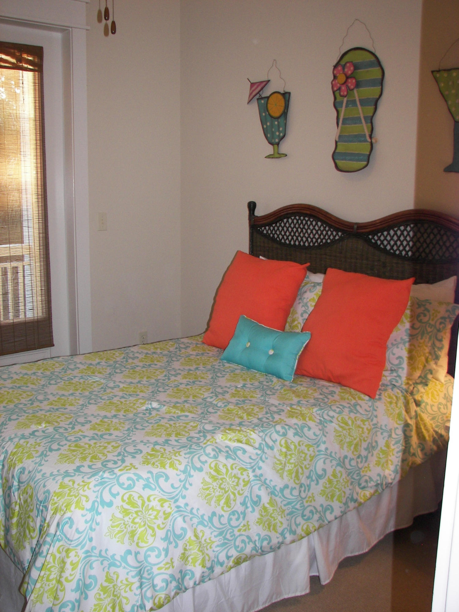 69 Lifeguard Loop West Inlet Beach, FL 32461 - Photo 33 of 34 a bedroom with a bed and a window