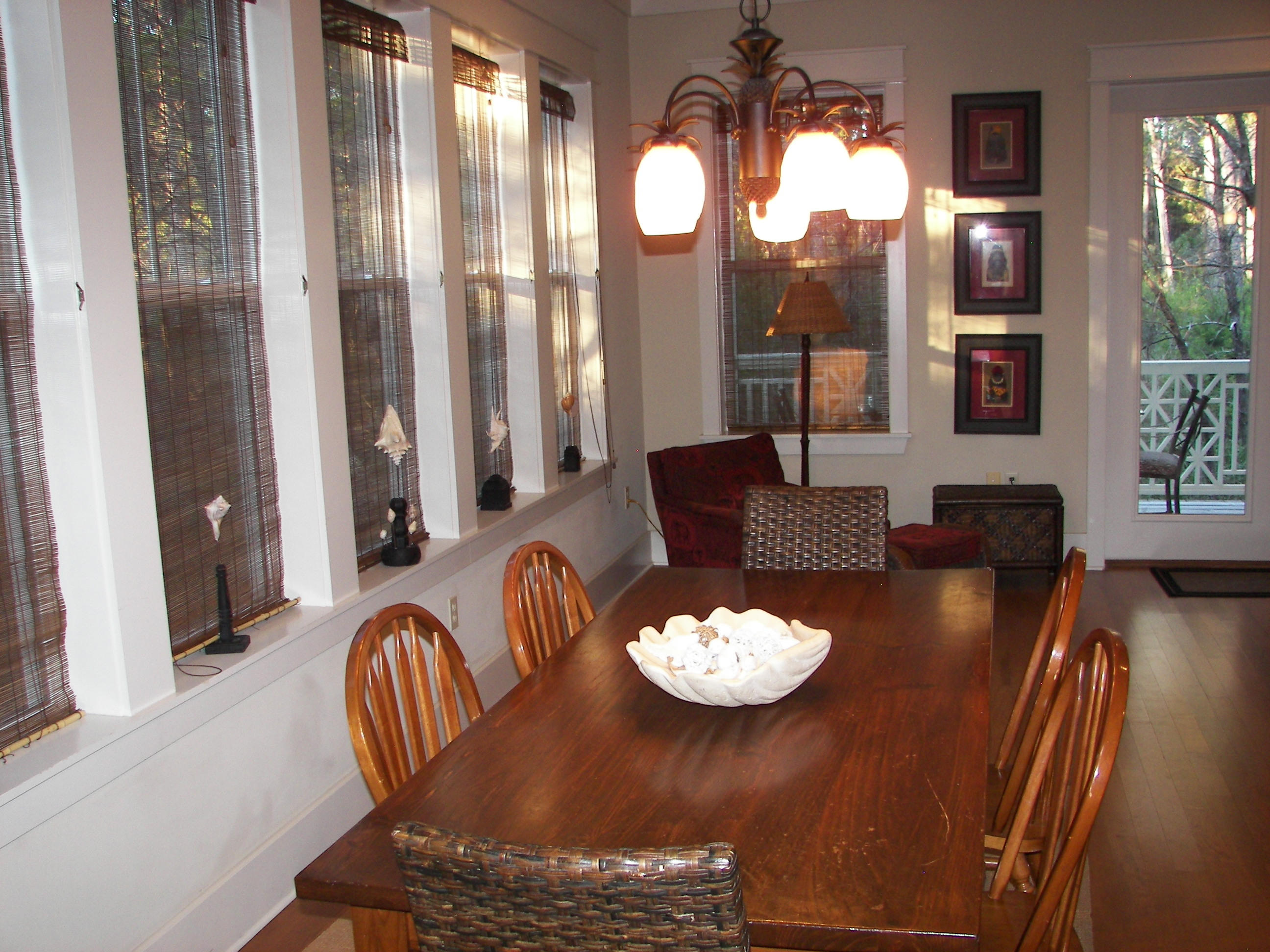69 Lifeguard Loop West Inlet Beach, FL 32461 - Photo 6 of 34 a view of a dining room with furniture window and wooden floor