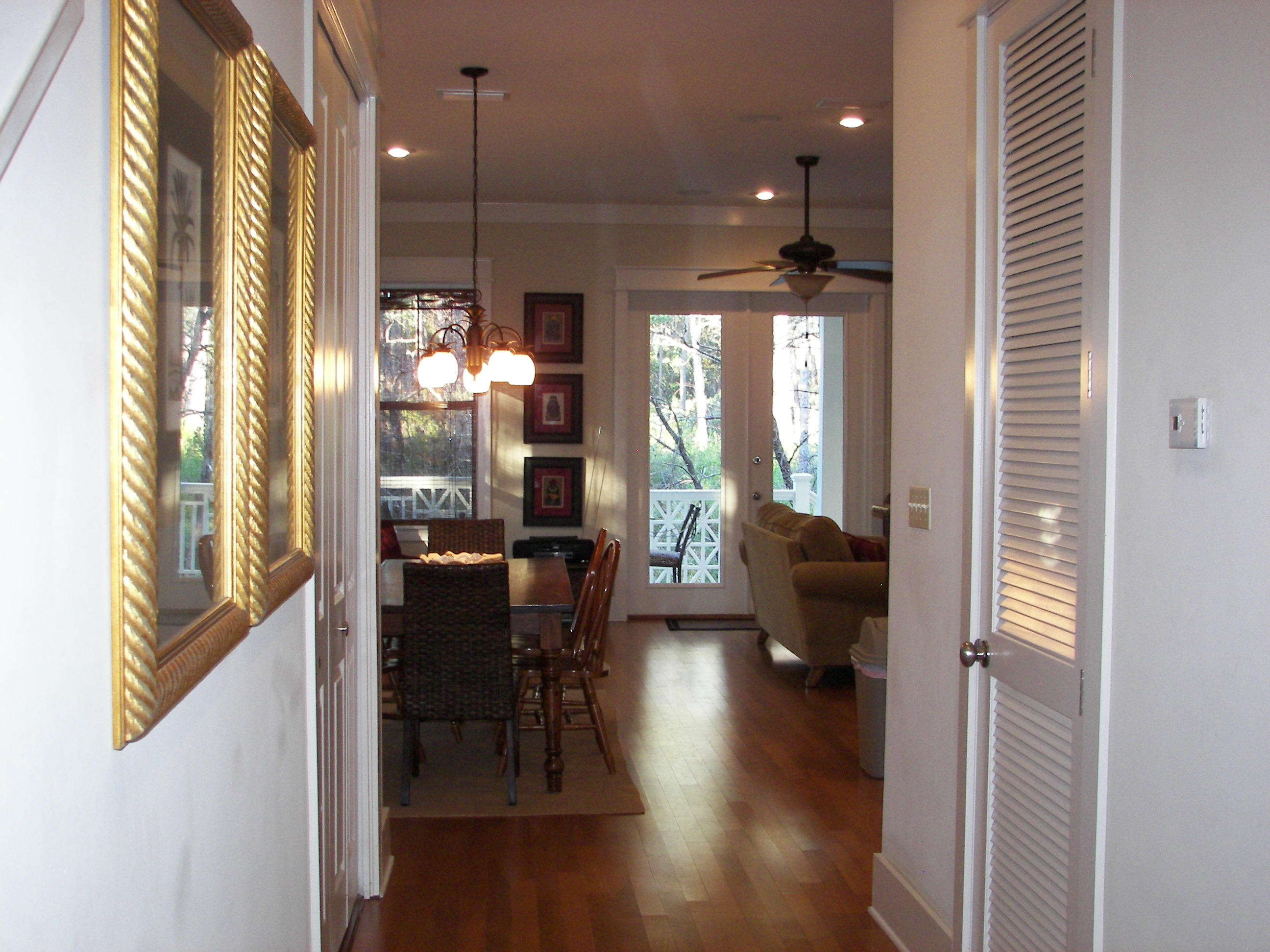 69 Lifeguard Loop West Inlet Beach, FL 32461 - Photo 7 of 34 a view of a dining room with furniture window and wooden floor