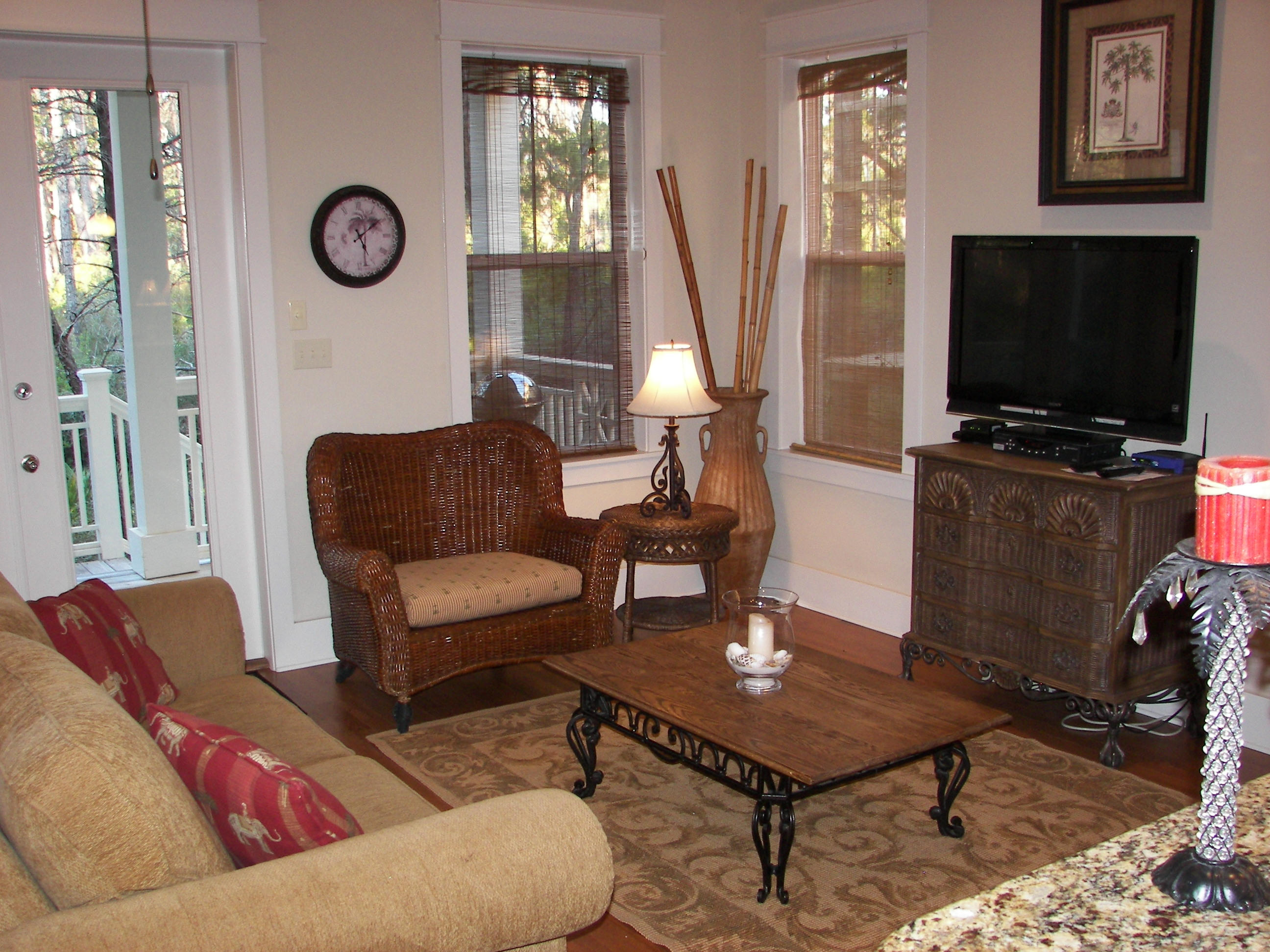69 Lifeguard Loop West Inlet Beach, FL 32461 - Photo 9 of 34 a living room with furniture a flat screen tv and a table