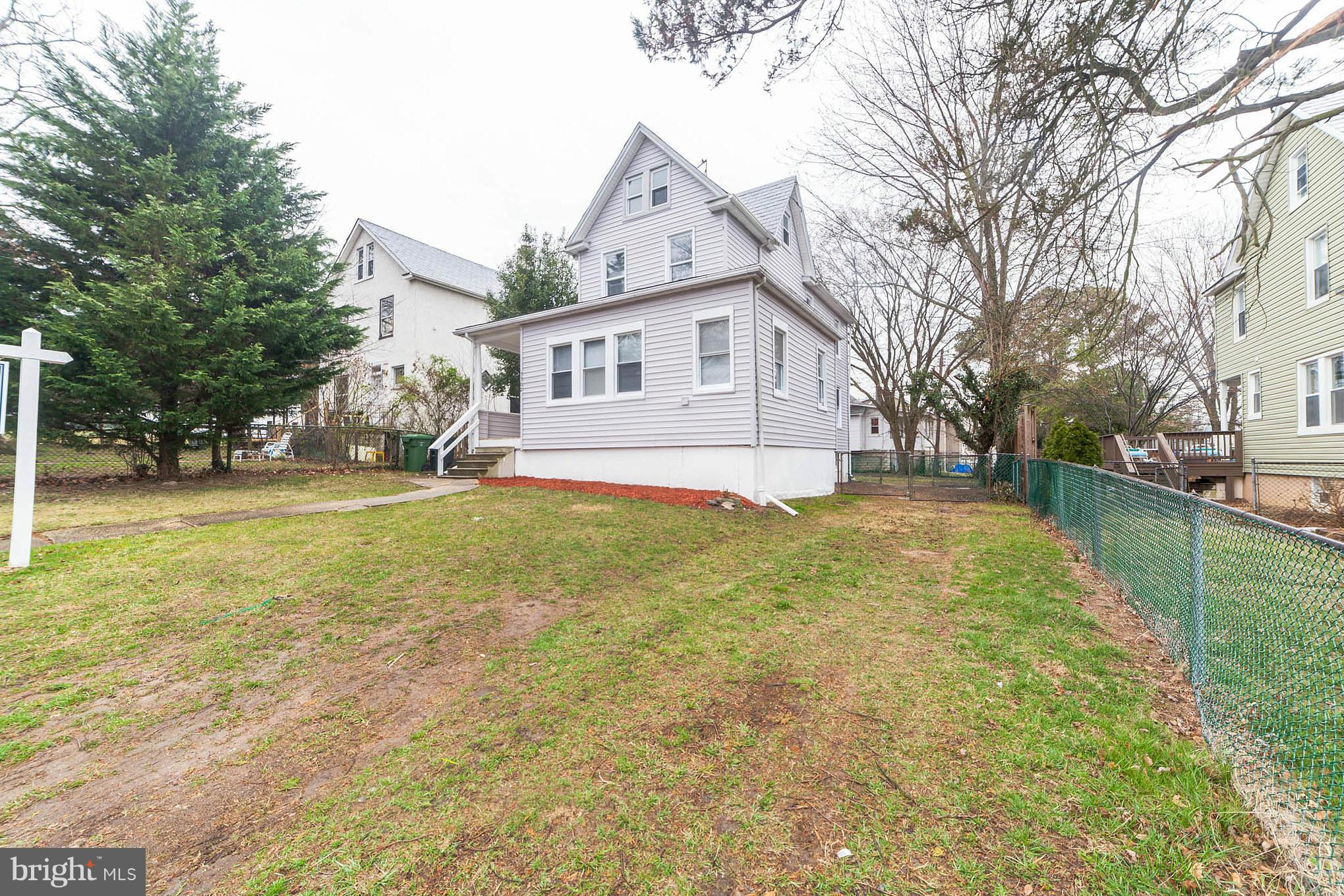 5502 Tramore Road Baltimore, MD 21214 - Photo 3 of 30 a view of a house with a yard