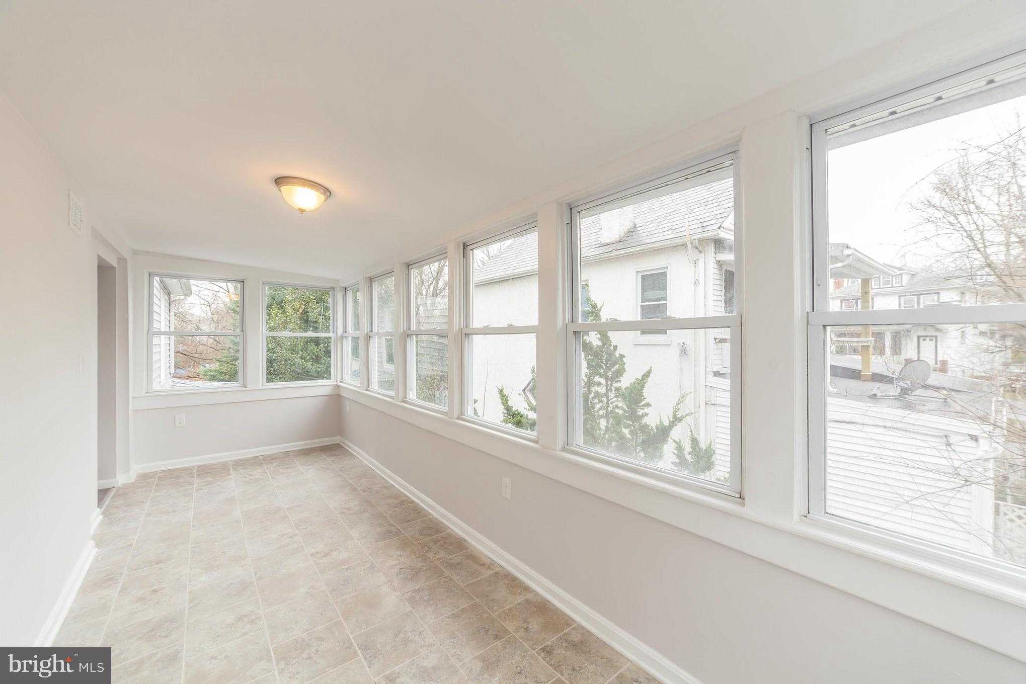 5502 Tramore Road Baltimore, MD 21214 - Photo 27 of 30 a view of an empty room with a window