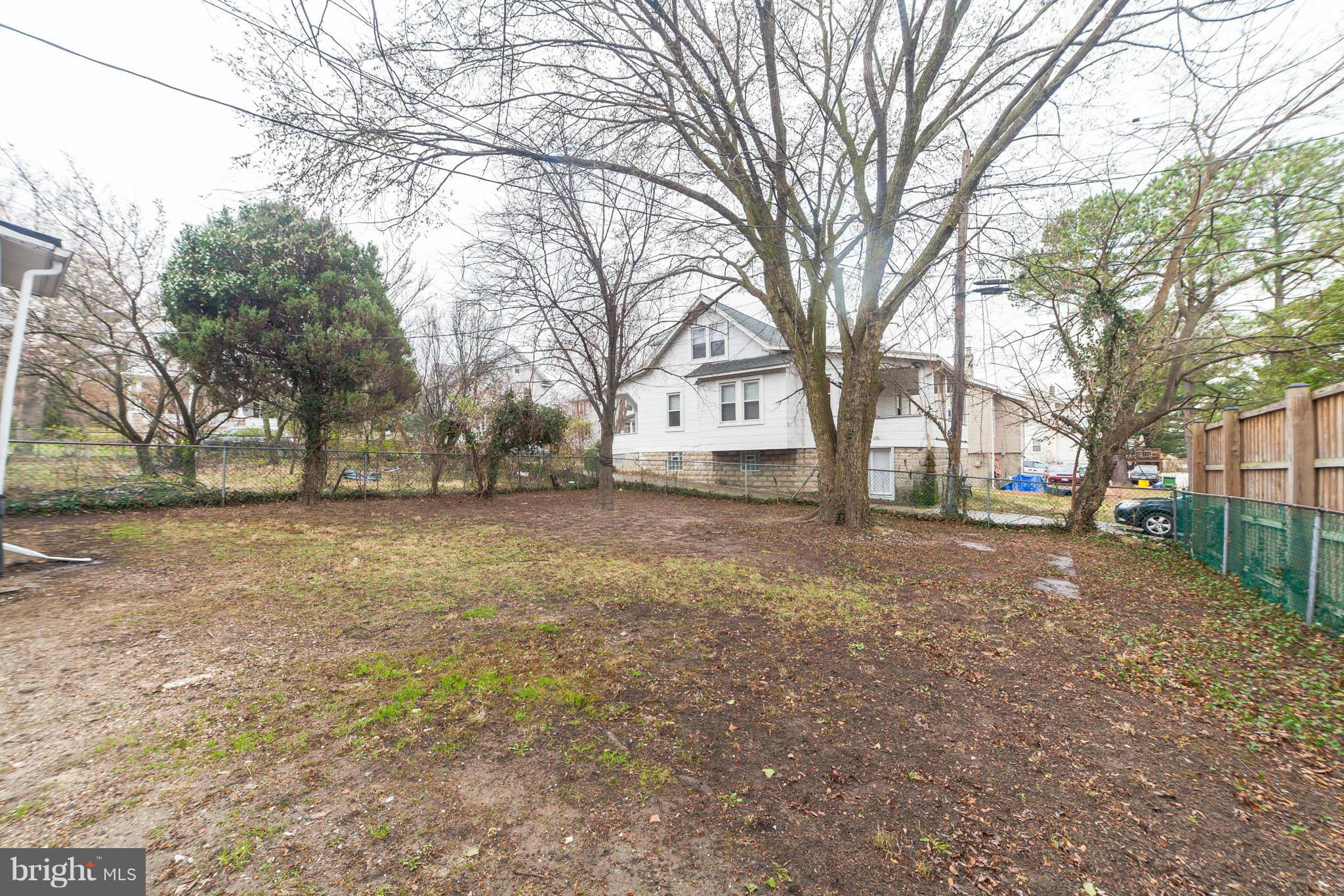 5502 Tramore Road Baltimore, MD 21214 - Photo 5 of 30 a view of a yard with tree s