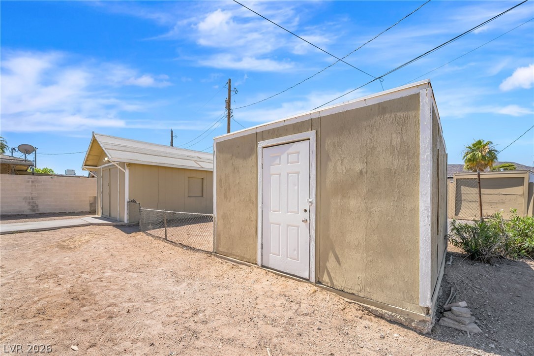 2 California Way Henderson, NV 89015 - Photo 27 of 29 Secure storage solutions with multiple outbuildings on a spacious lot.