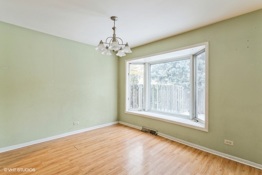 190 Roberts Road Bolingbrook, IL 60440 - Photo 8 of 15 a view of an empty room with a window