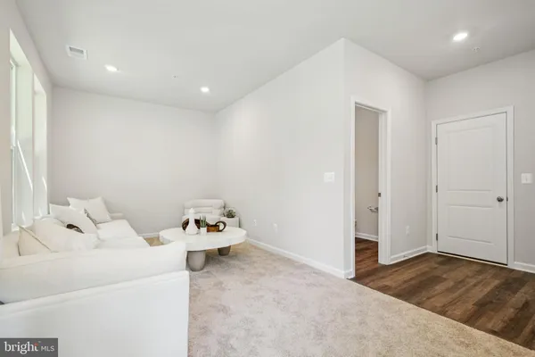 a utility room with a sink dryer and washer