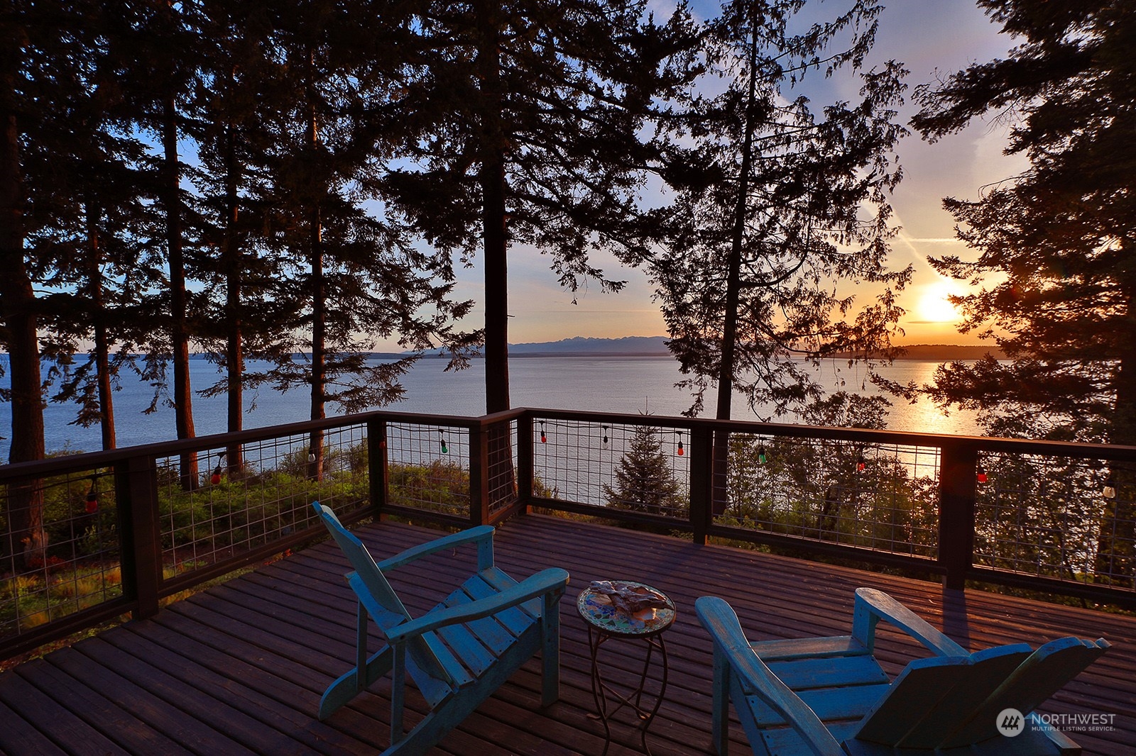 6828 Sills Road Clinton, WA 98236 - Photo 1 of 40 a view of balcony with wooden floor and fence