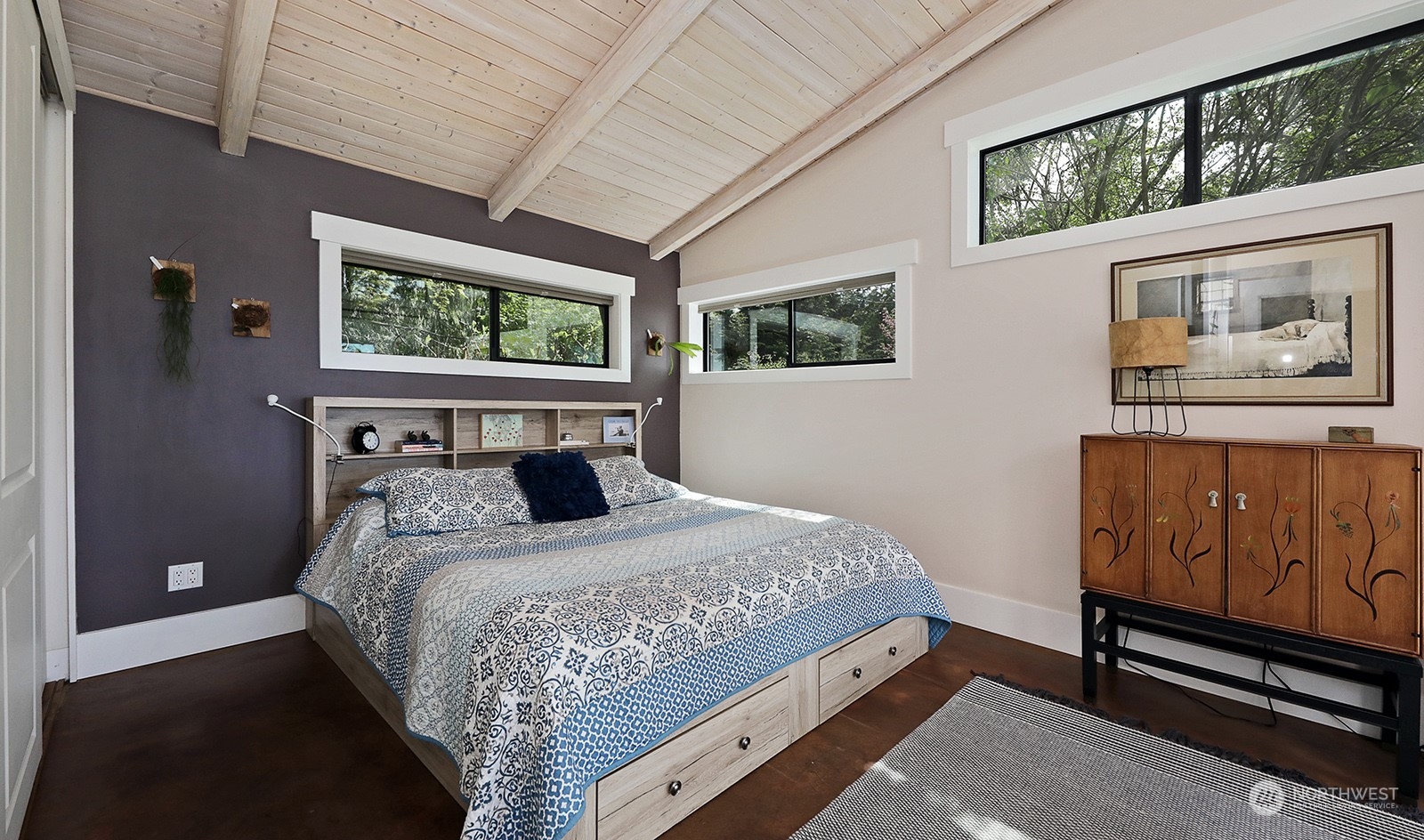 6828 Sills Road Clinton, WA 98236 - Photo 18 of 40 a bedroom with a bed and window