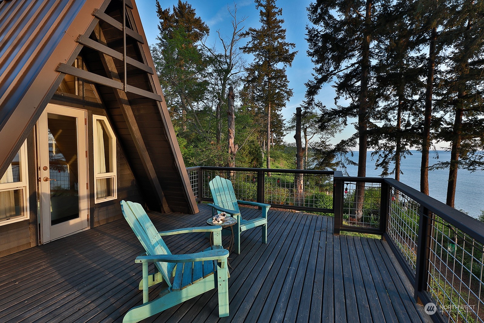 6828 Sills Road Clinton, WA 98236 - Photo 27 of 40 a view of a chairs on the roof deck