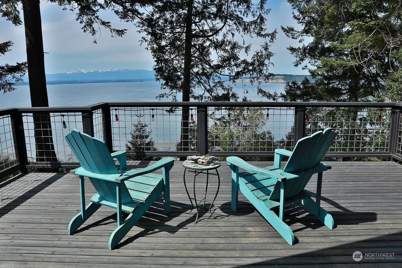 6828 Sills Road Clinton, WA 98236 - Photo 28 of 40 a view of a balcony with chairs