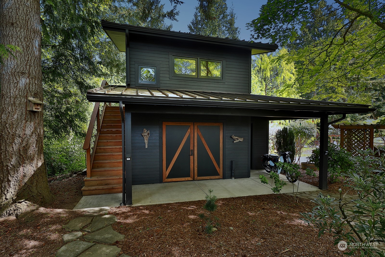 6828 Sills Road Clinton, WA 98236 - Photo 29 of 40 a front view of a house with a yard