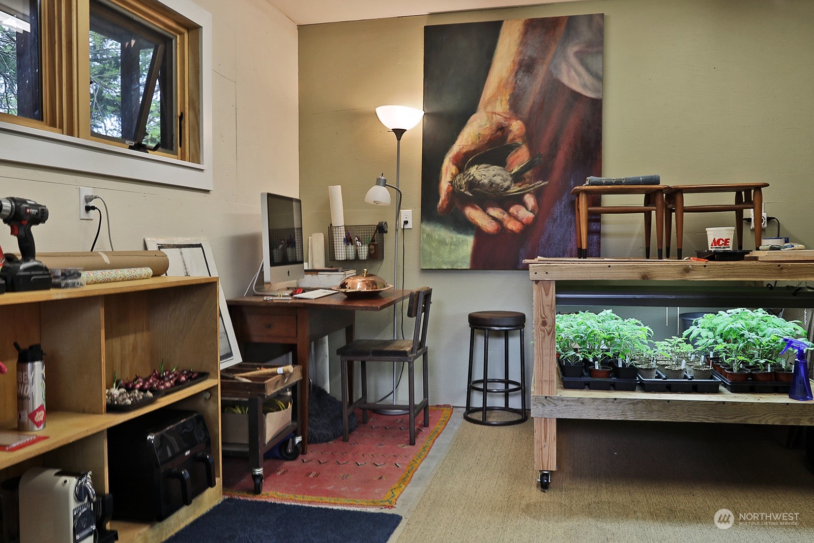 6828 Sills Road Clinton, WA 98236 - Photo 30 of 40 a workspace with furniture and a window
