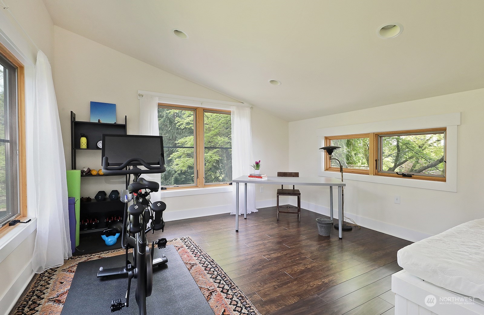 6828 Sills Road Clinton, WA 98236 - Photo 31 of 40 a view of a livingroom with workspace and a window