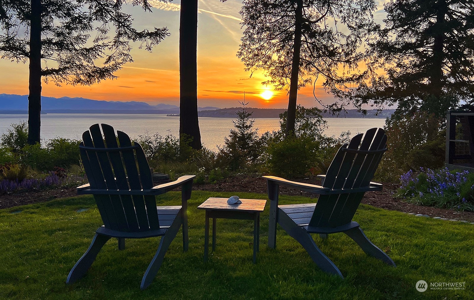 6828 Sills Road Clinton, WA 98236 - Photo 40 of 40 a view of a chairs and table in the garden