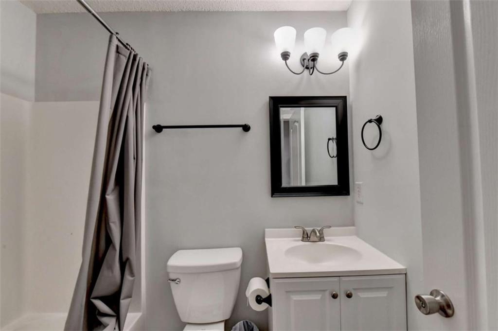 526 Terrapin Lane Winder, GA 30680 - Photo 23 of 40 a bathroom with a toilet sink and mirror