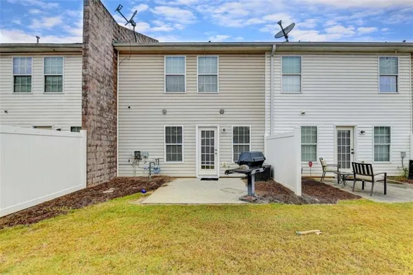 a view of a house with a patio
