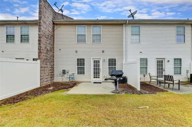 a view of a house with a patio